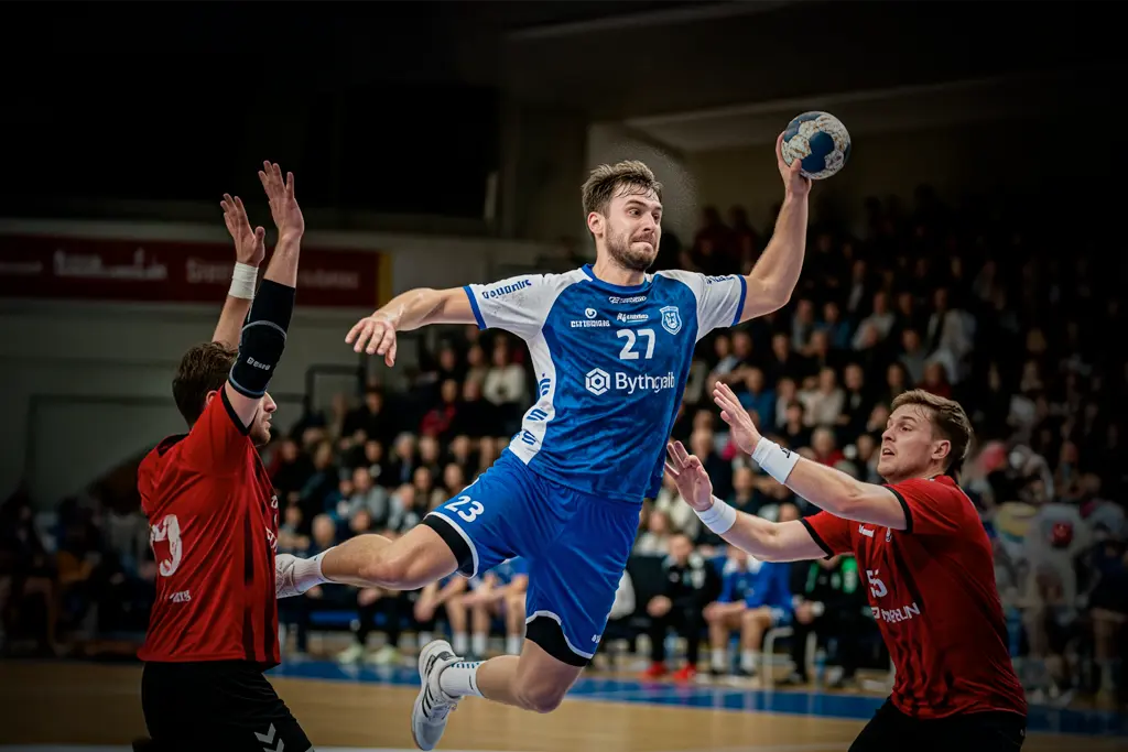 Professional handball match with comprehensive league coverage including Bundesliga